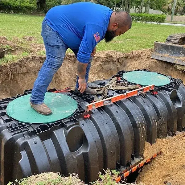 Septic service truck on site at a rural East Texas property